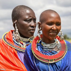 Africa, Tanzania, Masai tribe - april 3, 2016: Masai women of the tribe in a village in traditional dress